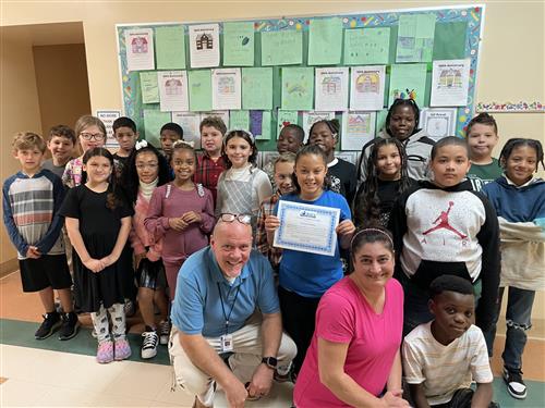 Victoria Torres, Harding's Stairclimber for the month of October, poses with her certificate and classmates.